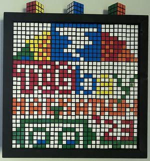 Rubik's cubes as pixel art of the TCG logo for the TCGbay Hackathon 2023