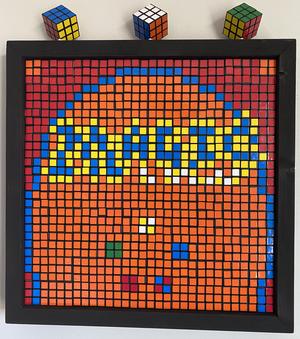Rubik's cubes as pixel art of the back of a Magic: The Gathering card