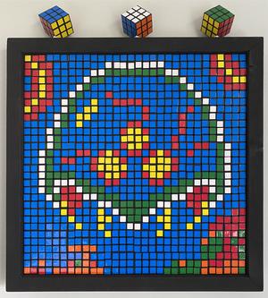 Rubik's cubes as pixel art of a Metroid surround by Rinka, Samus, and a missile.