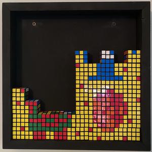 Some Rubik's Cubes filling up the bottom of a frame