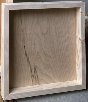 An unfinished wooden frame